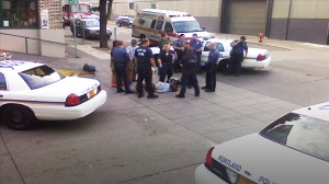 Portland Police Watching A Restrained Jim Chasse who was suffering multiple injuries.